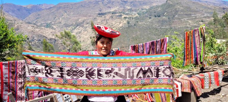 Woman from Llamas in Lares de Choquecancha showing the finished product