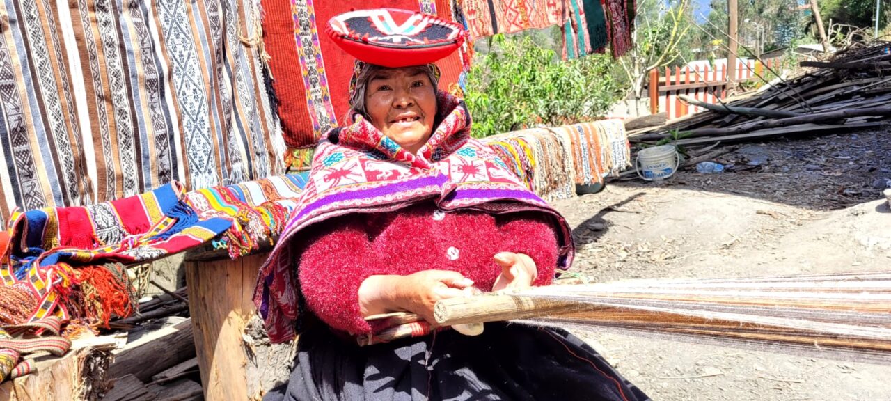 Older Peruvian Woman Weaving
