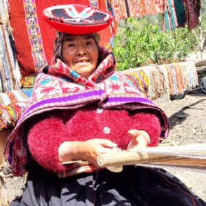 Older Peruvian Woman Weaving